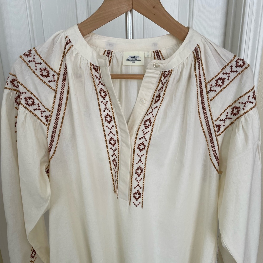 Cream color peasant style blouse with embroidery . .Brand new ,never worn .